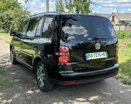 Черный Фольксваген Туран, объемом двигателя 1.39 л и пробегом 191 тыс. км за 8500 $, фото 5 на Automoto.ua