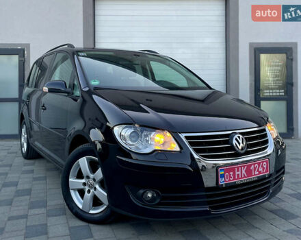 Чорний Фольксваген Туран, об'ємом двигуна 2 л та пробігом 292 тис. км за 8999 $, фото 8 на Automoto.ua