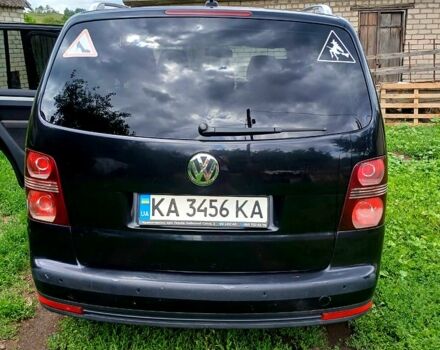Черный Фольксваген Туран, объемом двигателя 1.4 л и пробегом 240 тыс. км за 6500 $, фото 5 на Automoto.ua