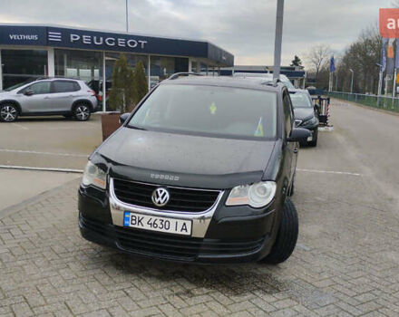 Чорний Фольксваген Туран, об'ємом двигуна 1.4 л та пробігом 330 тис. км за 7000 $, фото 4 на Automoto.ua