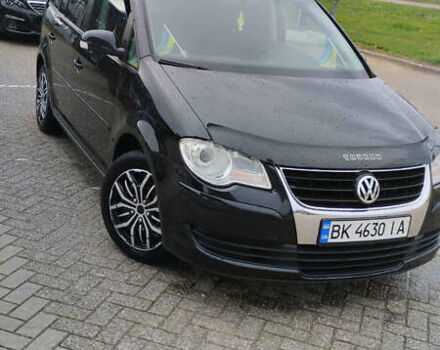 Чорний Фольксваген Туран, об'ємом двигуна 1.4 л та пробігом 330 тис. км за 7000 $, фото 1 на Automoto.ua