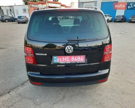 Черный Фольксваген Туран, объемом двигателя 1.6 л и пробегом 213 тыс. км за 8550 $, фото 112 на Automoto.ua