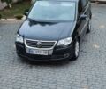 Черный Фольксваген Туран, объемом двигателя 2 л и пробегом 260 тыс. км за 7450 $, фото 1 на Automoto.ua