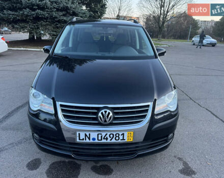 Черный Фольксваген Туран, объемом двигателя 1.4 л и пробегом 224 тыс. км за 6499 $, фото 1 на Automoto.ua