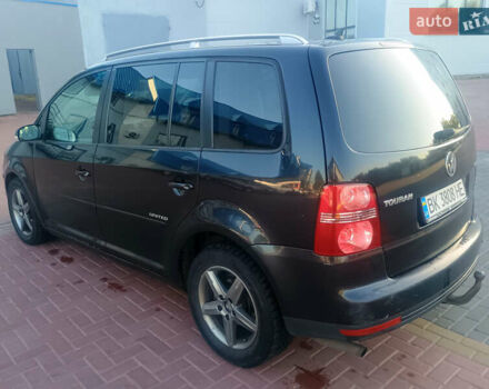 Черный Фольксваген Туран, объемом двигателя 2 л и пробегом 290 тыс. км за 6500 $, фото 5 на Automoto.ua