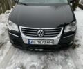 Черный Фольксваген Туран, объемом двигателя 1.4 л и пробегом 229 тыс. км за 6850 $, фото 1 на Automoto.ua