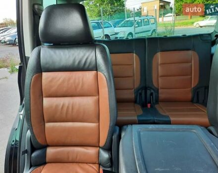 Черный Фольксваген Туран, объемом двигателя 1.6 л и пробегом 213 тыс. км за 8550 $, фото 105 на Automoto.ua