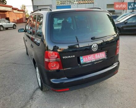 Черный Фольксваген Туран, объемом двигателя 1.6 л и пробегом 213 тыс. км за 8550 $, фото 14 на Automoto.ua