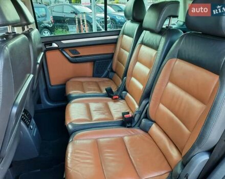 Черный Фольксваген Туран, объемом двигателя 1.6 л и пробегом 213 тыс. км за 8550 $, фото 81 на Automoto.ua