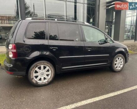 Черный Фольксваген Туран, объемом двигателя 2 л и пробегом 208 тыс. км за 7771 $, фото 6 на Automoto.ua