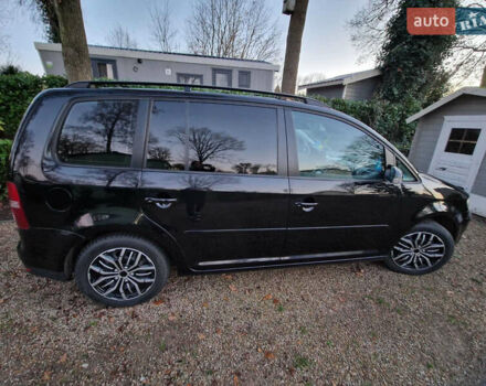 Чорний Фольксваген Туран, об'ємом двигуна 1.4 л та пробігом 330 тис. км за 7000 $, фото 2 на Automoto.ua