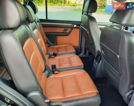 Черный Фольксваген Туран, объемом двигателя 1.6 л и пробегом 213 тыс. км за 8550 $, фото 134 на Automoto.ua