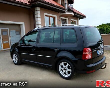 Черный Фольксваген Туран, объемом двигателя 2 л и пробегом 268 тыс. км за 2400 $, фото 2 на Automoto.ua