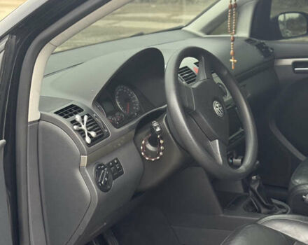 Черный Фольксваген Туран, объемом двигателя 1.4 л и пробегом 247 тыс. км за 7500 $, фото 9 на Automoto.ua