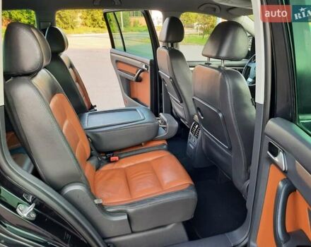 Черный Фольксваген Туран, объемом двигателя 1.6 л и пробегом 213 тыс. км за 8550 $, фото 97 на Automoto.ua