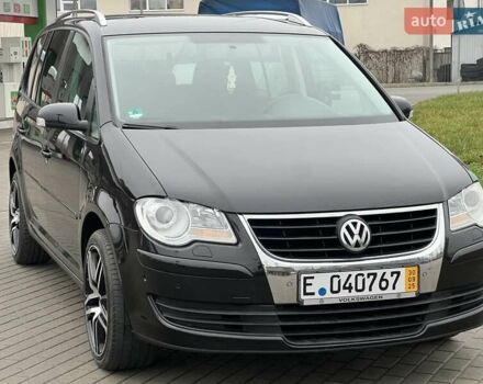 Чорний Фольксваген Туран, об'ємом двигуна 1.6 л та пробігом 147 тис. км за 8350 $, фото 1 на Automoto.ua