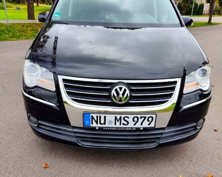 Черный Фольксваген Туран, объемом двигателя 2 л и пробегом 318 тыс. км за 2400 $, фото 5 на Automoto.ua
