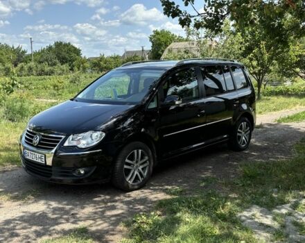 Черный Фольксваген Туран, объемом двигателя 1.4 л и пробегом 191 тыс. км за 8500 $, фото 8 на Automoto.ua