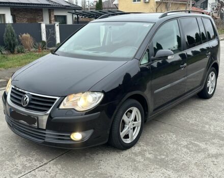 Черный Фольксваген Туран, объемом двигателя 1.9 л и пробегом 280 тыс. км за 4500 $, фото 1 на Automoto.ua