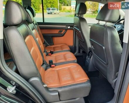 Черный Фольксваген Туран, объемом двигателя 1.6 л и пробегом 213 тыс. км за 8550 $, фото 131 на Automoto.ua