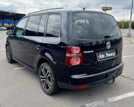 Черный Фольксваген Туран, объемом двигателя 1.4 л и пробегом 211 тыс. км за 7100 $, фото 4 на Automoto.ua