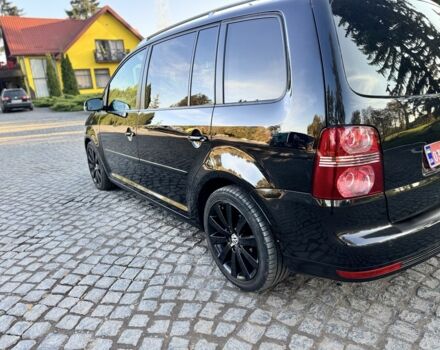 Черный Фольксваген Туран, объемом двигателя 1.4 л и пробегом 200 тыс. км за 7300 $, фото 2 на Automoto.ua