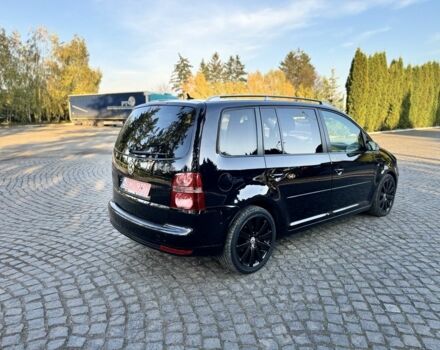 Черный Фольксваген Туран, объемом двигателя 1.4 л и пробегом 200 тыс. км за 7300 $, фото 4 на Automoto.ua