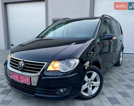 Чорний Фольксваген Туран, об'ємом двигуна 2 л та пробігом 292 тис. км за 8999 $, фото 25 на Automoto.ua