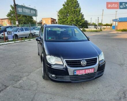 Черный Фольксваген Туран, объемом двигателя 1.6 л и пробегом 213 тыс. км за 8550 $, фото 2 на Automoto.ua