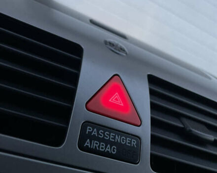 Чорний Фольксваген Туран, об'ємом двигуна 2 л та пробігом 292 тис. км за 8999 $, фото 56 на Automoto.ua