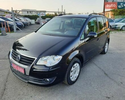 Черный Фольксваген Туран, объемом двигателя 1.6 л и пробегом 213 тыс. км за 8550 $, фото 153 на Automoto.ua