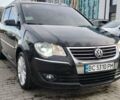 Черный Фольксваген Туран, объемом двигателя 1.4 л и пробегом 220 тыс. км за 7200 $, фото 1 на Automoto.ua