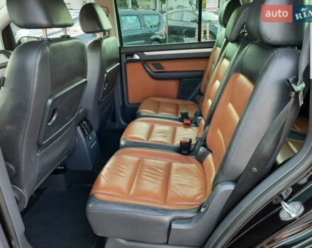 Черный Фольксваген Туран, объемом двигателя 1.6 л и пробегом 213 тыс. км за 8550 $, фото 79 на Automoto.ua