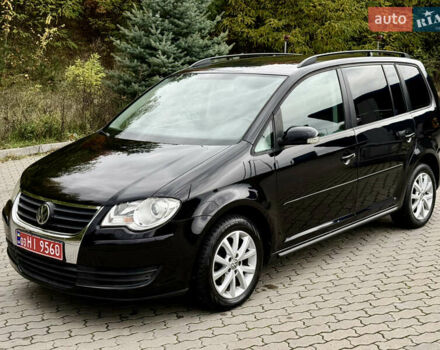 Черный Фольксваген Туран, объемом двигателя 1.6 л и пробегом 200 тыс. км за 7700 $, фото 2 на Automoto.ua