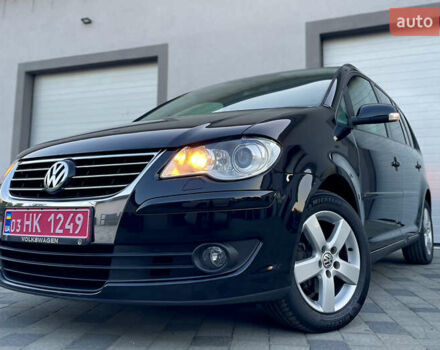 Чорний Фольксваген Туран, об'ємом двигуна 2 л та пробігом 292 тис. км за 8999 $, фото 23 на Automoto.ua