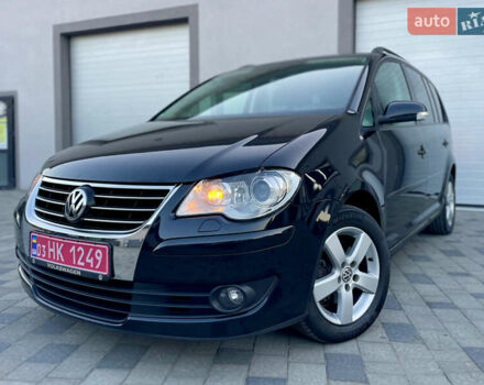Чорний Фольксваген Туран, об'ємом двигуна 2 л та пробігом 292 тис. км за 8999 $, фото 22 на Automoto.ua