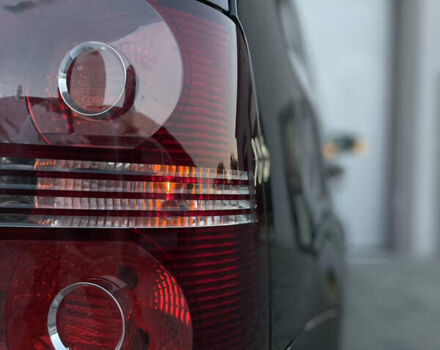 Чорний Фольксваген Туран, об'ємом двигуна 2 л та пробігом 292 тис. км за 8999 $, фото 37 на Automoto.ua