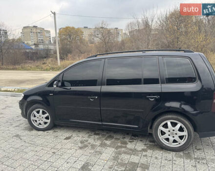 Черный Фольксваген Туран, объемом двигателя 1.4 л и пробегом 247 тыс. км за 7500 $, фото 8 на Automoto.ua