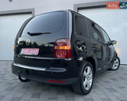 Чорний Фольксваген Туран, об'ємом двигуна 2 л та пробігом 292 тис. км за 8999 $, фото 42 на Automoto.ua