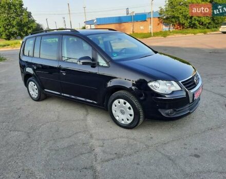 Черный Фольксваген Туран, объемом двигателя 1.6 л и пробегом 213 тыс. км за 8550 $, фото 25 на Automoto.ua