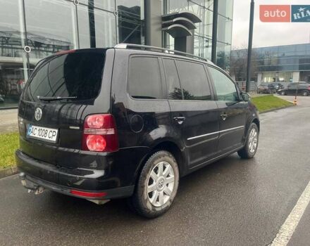 Черный Фольксваген Туран, объемом двигателя 2 л и пробегом 208 тыс. км за 7771 $, фото 7 на Automoto.ua