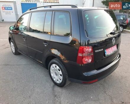 Черный Фольксваген Туран, объемом двигателя 1.6 л и пробегом 213 тыс. км за 8550 $, фото 13 на Automoto.ua