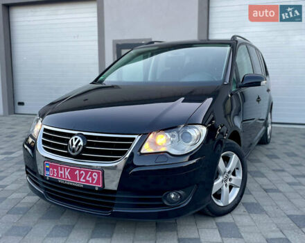 Чорний Фольксваген Туран, об'ємом двигуна 2 л та пробігом 292 тис. км за 8999 $, фото 21 на Automoto.ua