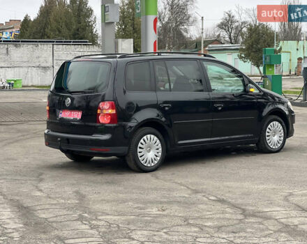 Черный Фольксваген Туран, объемом двигателя 1.6 л и пробегом 193 тыс. км за 7799 $, фото 16 на Automoto.ua