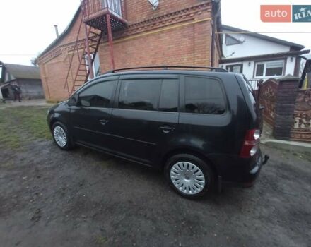 Черный Фольксваген Туран, объемом двигателя 1.9 л и пробегом 293 тыс. км за 7000 $, фото 3 на Automoto.ua