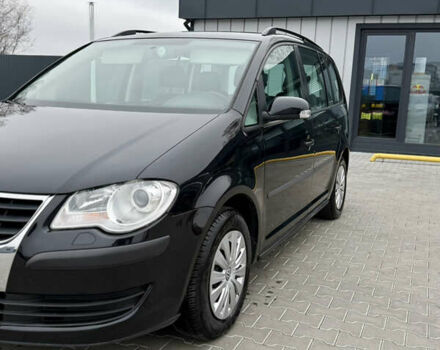 Черный Фольксваген Туран, объемом двигателя 1.4 л и пробегом 227 тыс. км за 7200 $, фото 5 на Automoto.ua