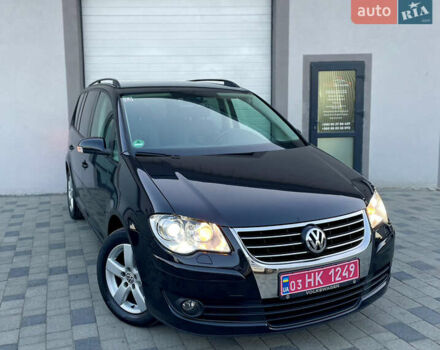 Чорний Фольксваген Туран, об'ємом двигуна 2 л та пробігом 292 тис. км за 8999 $, фото 4 на Automoto.ua