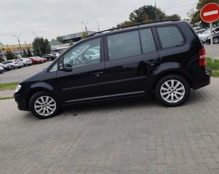 Чорний Фольксваген Туран, об'ємом двигуна 1.4 л та пробігом 194 тис. км за 6600 $, фото 2 на Automoto.ua