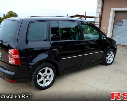 Черный Фольксваген Туран, объемом двигателя 2 л и пробегом 268 тыс. км за 2400 $, фото 4 на Automoto.ua