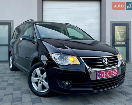 Чорний Фольксваген Туран, об'ємом двигуна 2 л та пробігом 292 тис. км за 8999 $, фото 9 на Automoto.ua